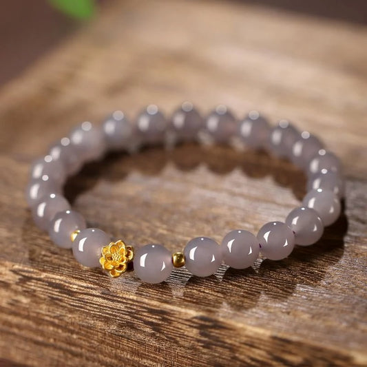 This elegant light gray crystal bracelet adds a subtle and refined touch to any look, perfect for those seeking understated sophistication