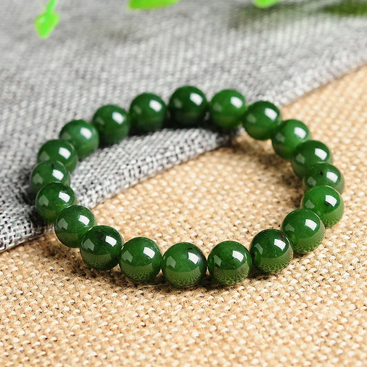 This natural green phantom crystal bracelet is crafted to enhance spiritual growth and transformation, offering a unique and powerful accessory for those seeking clarity and balance.