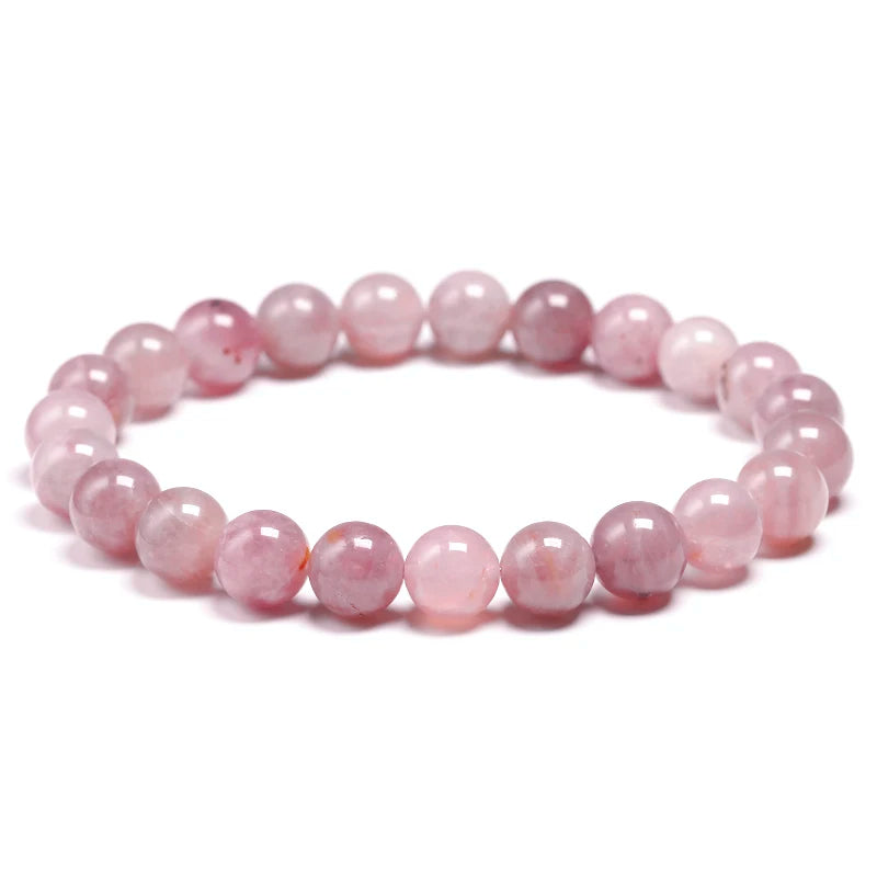  With polished rose quartz beads, this bracelet adds a soft, luxurious glow, ideal for those who appreciate classic, elegant pieces